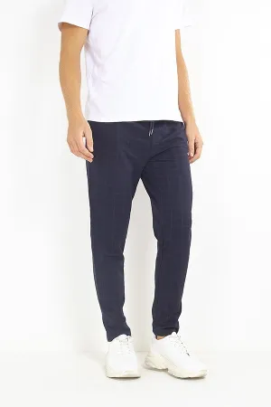 NAVY WINDOWPANE CHECK JERSEY DRAWSTRING TROUSERS